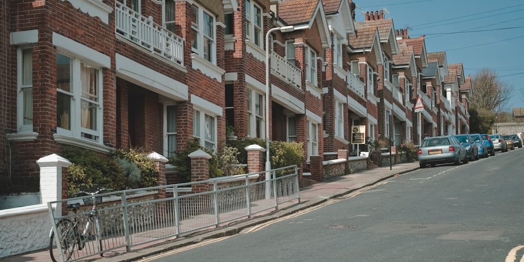 UK residential street, mortgage rates rise Row of UK homes, representing the impact of mortgage rate rises on borrowers